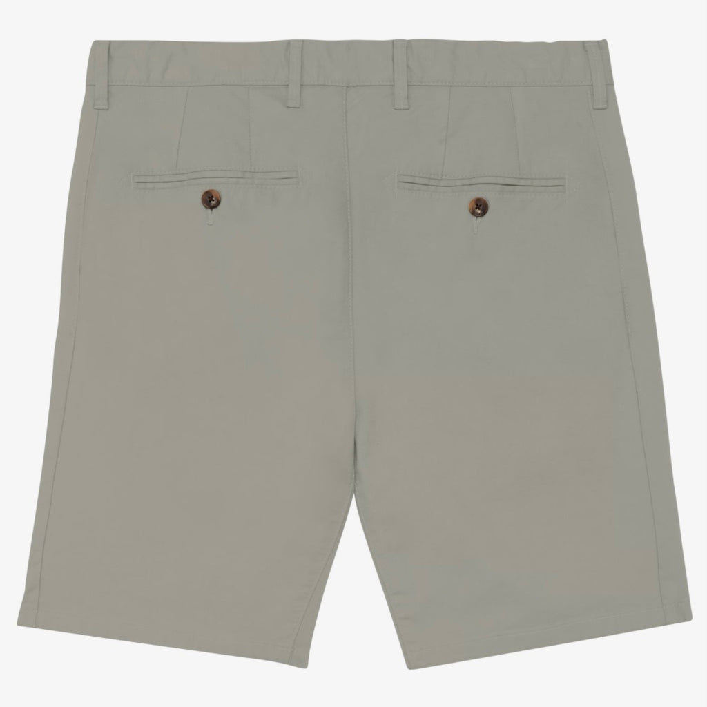 Back view of men's almond green coloured chino shorts with recycled button closures on two back pockets, and belt loops, shown flat against a neutral background.
