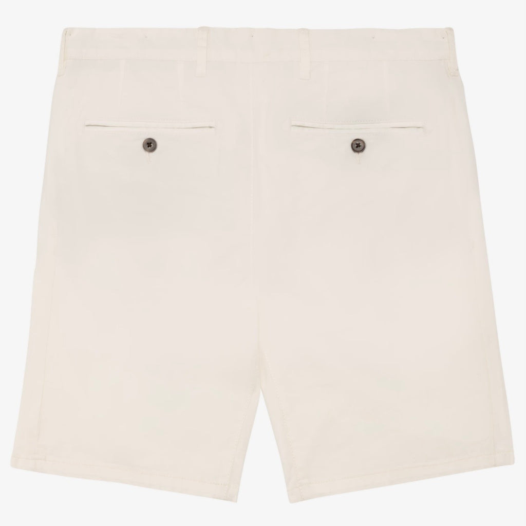 Back view of men's ivory coloured chino shorts with recycled button closures on two back pockets, and belt loops, shown flat against a neutral background.