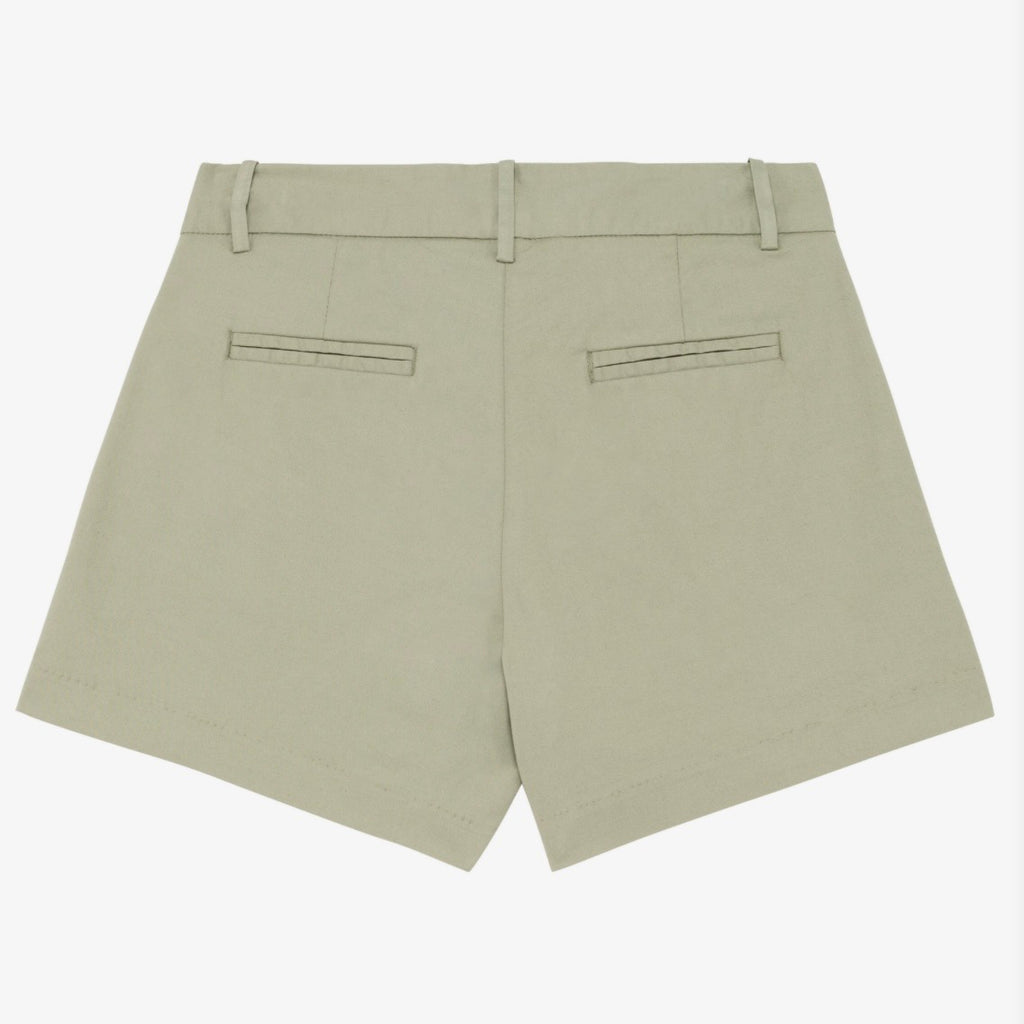 Women's almond green coloured chino shorts with a recycled button closure, and recycled metal zip, belt loops, and back pockets, shown flat against a neutral background.
