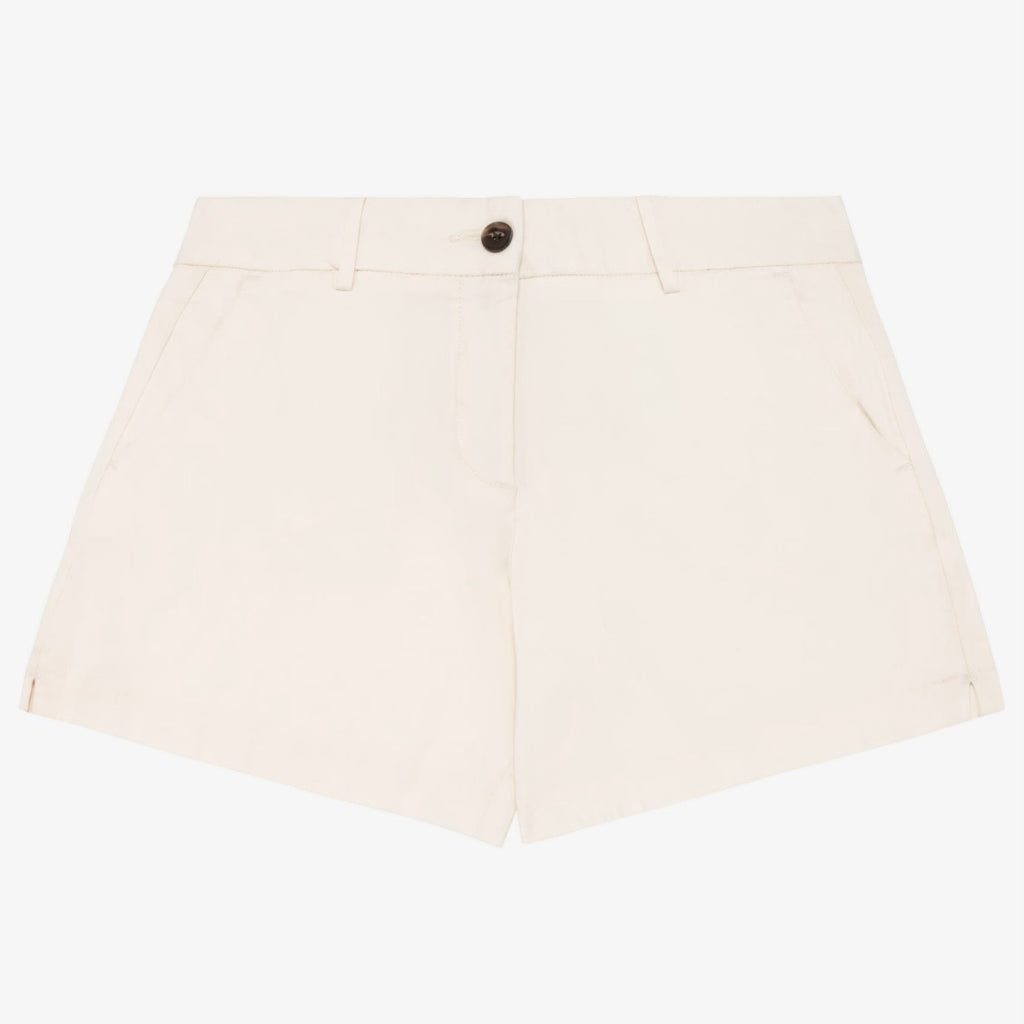 Women's ivory coloured chino shorts with a recycled button closure, and recycled metal zip, belt loops, and side pockets, shown flat against a neutral background.