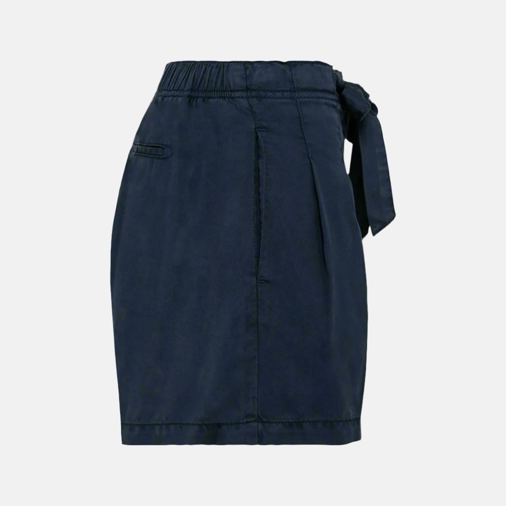 Side profile view of women's navy Tencel bow shorts against a neutral background.